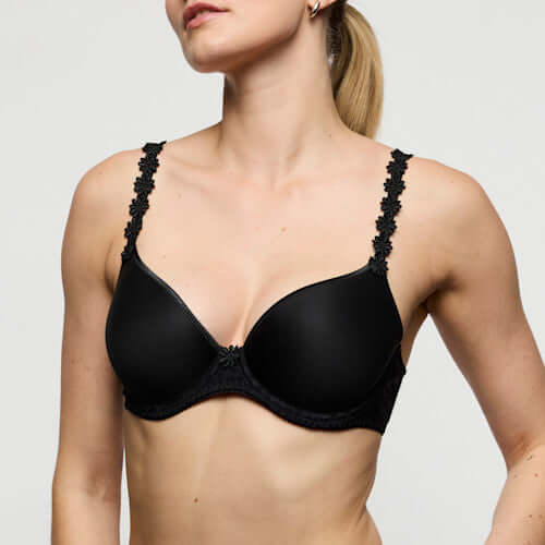 Marie Jo Avero Spacer Full Cup Bra in Black worn by a model, showcasing its iconic daisy straps and stylish design.