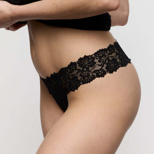 Marie Jo Soft Studio in Black thong featuring intricate lace detailing and a comfortable fit.