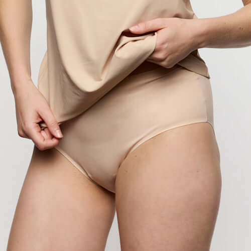 Marie Jo Soft Studio Full Briefs in Caffe Latte shown under a light top, highlighting the exquisite softness and comfort.