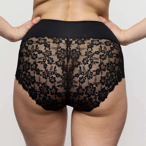 Marie Jo smoothing briefs 3 pack in black showcasing the lace detail and high-waisted design from the back.