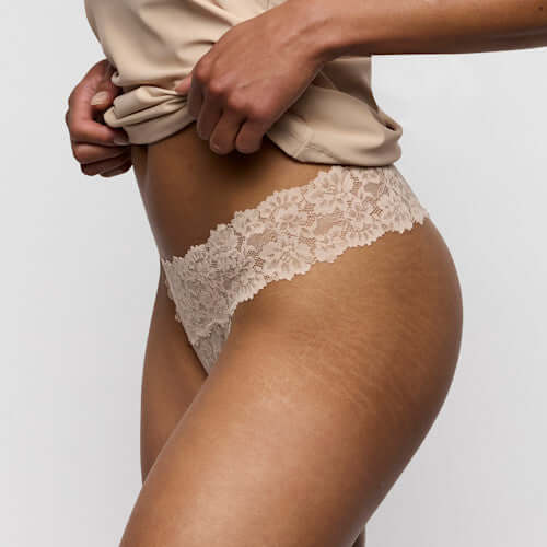 Marie Jo Soft Studio Thong in Caffe Latte showcasing exquisite softness and invisible comfort under clothing.