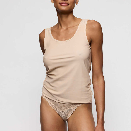 Marie Jo Soft Studio Top without Cups with wider straps in Caffe Latte worn by a model, showcasing exquisite softness and comfort.