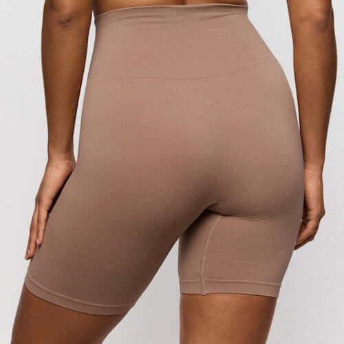 Primadonna Nudda Shapewear in Ginger high briefs with legs back view showing high waist and smoothing design.