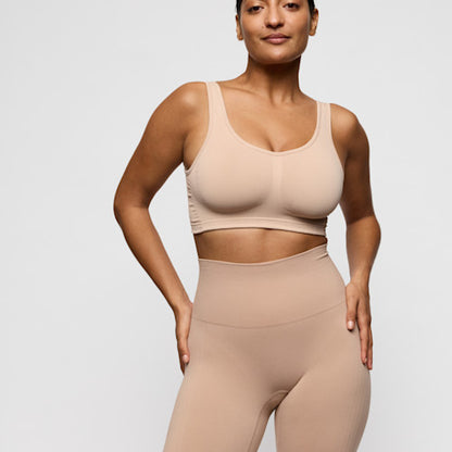 Primadonna Nudda shapewear high briefs with legs in caffe latte on a model demonstrating comfort and style.