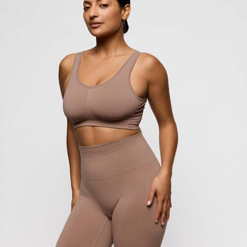 Primadonna Nudda Shapewear in Ginger high briefs with legs model wearing a matching crop top and leggings