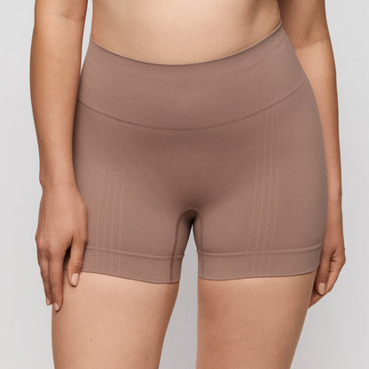 Primadonna NUDDA shapewear shorts in ginger - booty lifting shorts worn on model showing natural lift and smooth design.