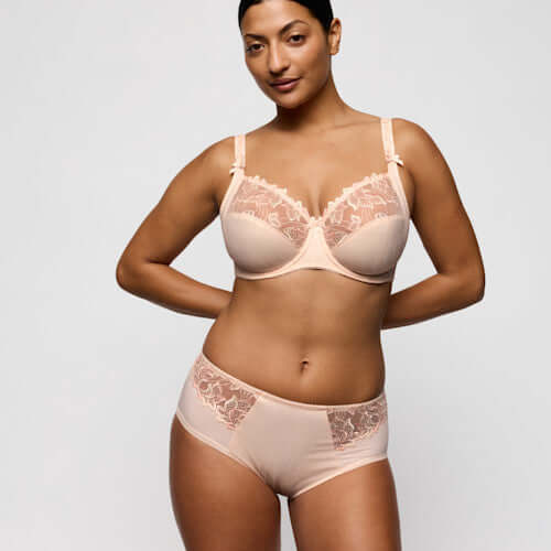 Primadonna Deauville Full Briefs in Venus worn by a model, showcasing a retro silhouette in a warm shade of pink.