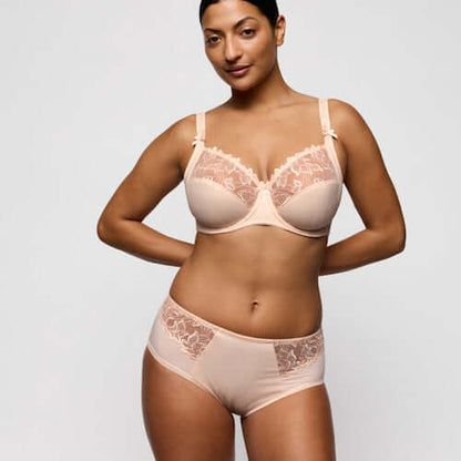 Primadonna Deauville Full Briefs in Venus worn by a model, showcasing a retro silhouette in a warm shade of pink.