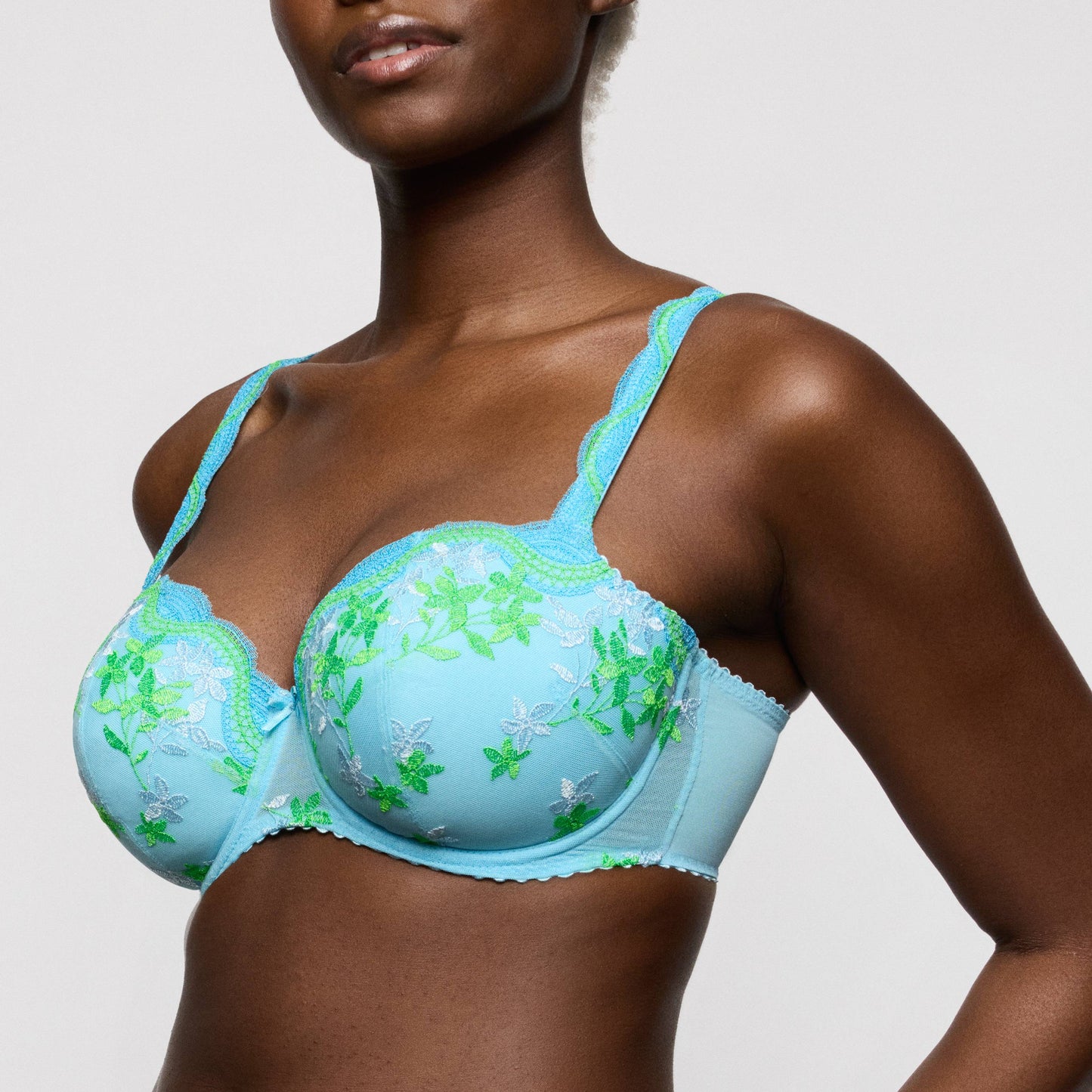 Primadonna CALA LUNA padded balcony bra in Ice Dream featuring vibrant blue color and floral embroidery.
