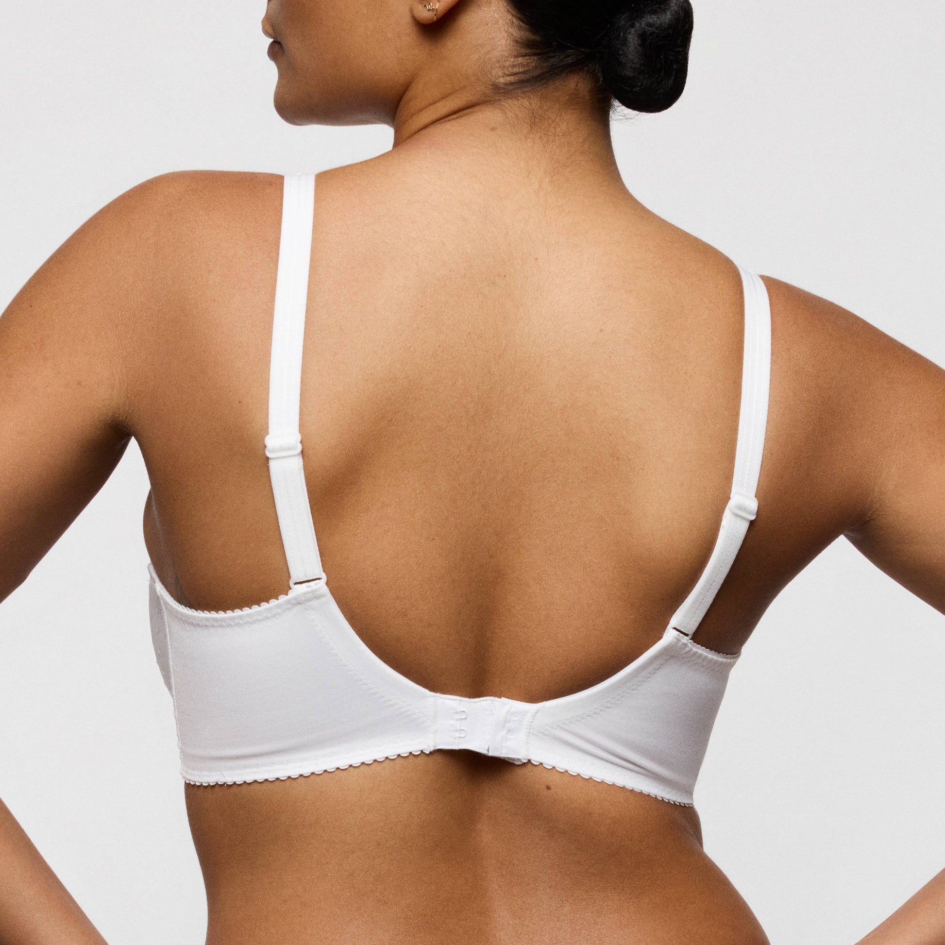 Back view of Primadonna OSINO balcony bra tulip seam in White with delicate straps and lace detailing.
