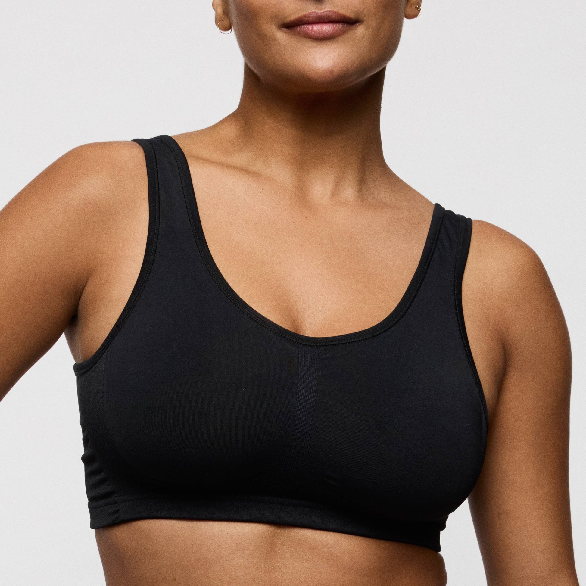 Primadonna NUDDA bralette in black worn by a model showcasing its stylish design and comfort.