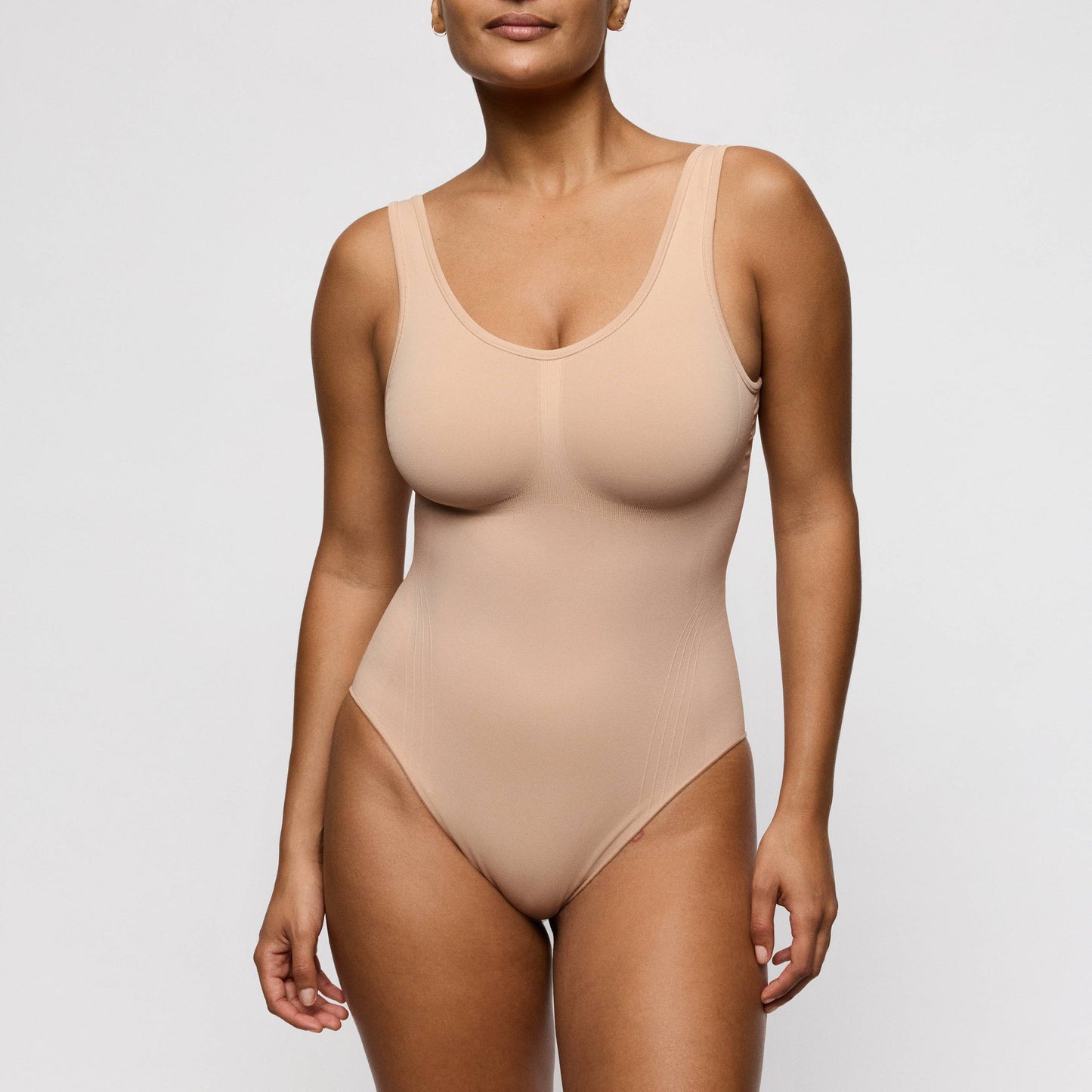 Caffé latte shapewear body - Primadonna Nudda featuring smooth design and built-in wireless bra for comfort.