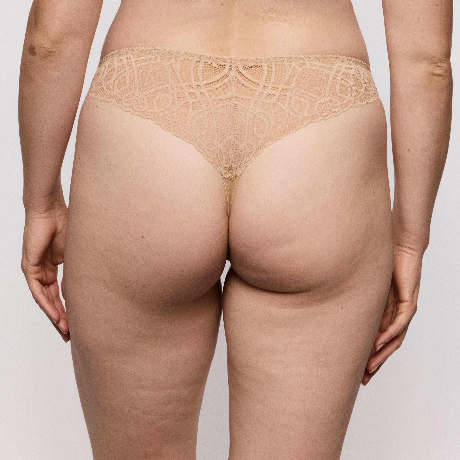 Primadonna SALERNO thong Candy Ginger, showing a back view highlighting the intricate lace design and flattering fit.