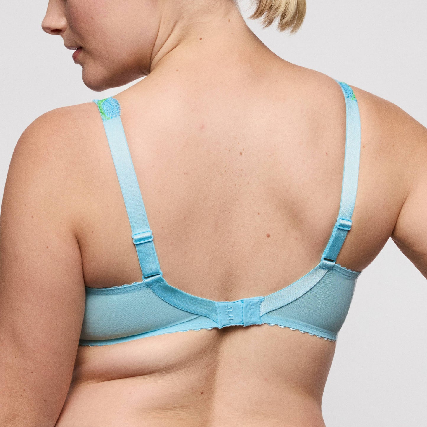 Back view of the Primadonna CALA LUNA full cup bra in Ice Dream, showcasing the vibrant blue and adjustable straps.