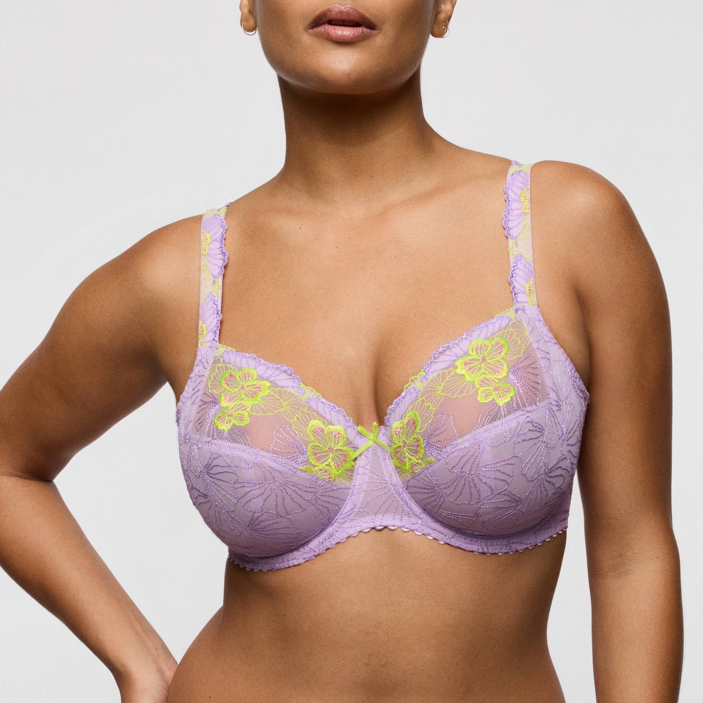 Primadonna IXIA full cup bra in Wisteria featuring lilac and lime floral details on a model.
