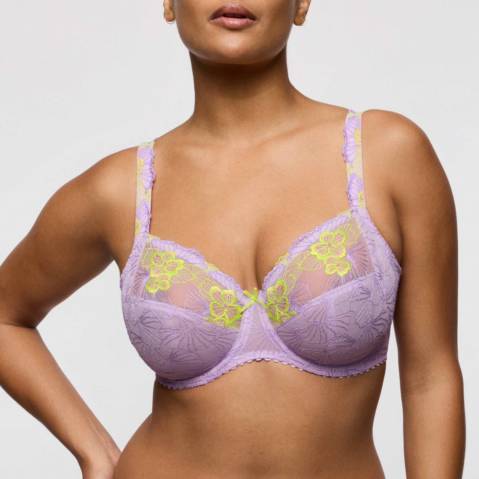 Primadonna IXIA full cup bra in Wisteria featuring lilac and lime floral details on a model.